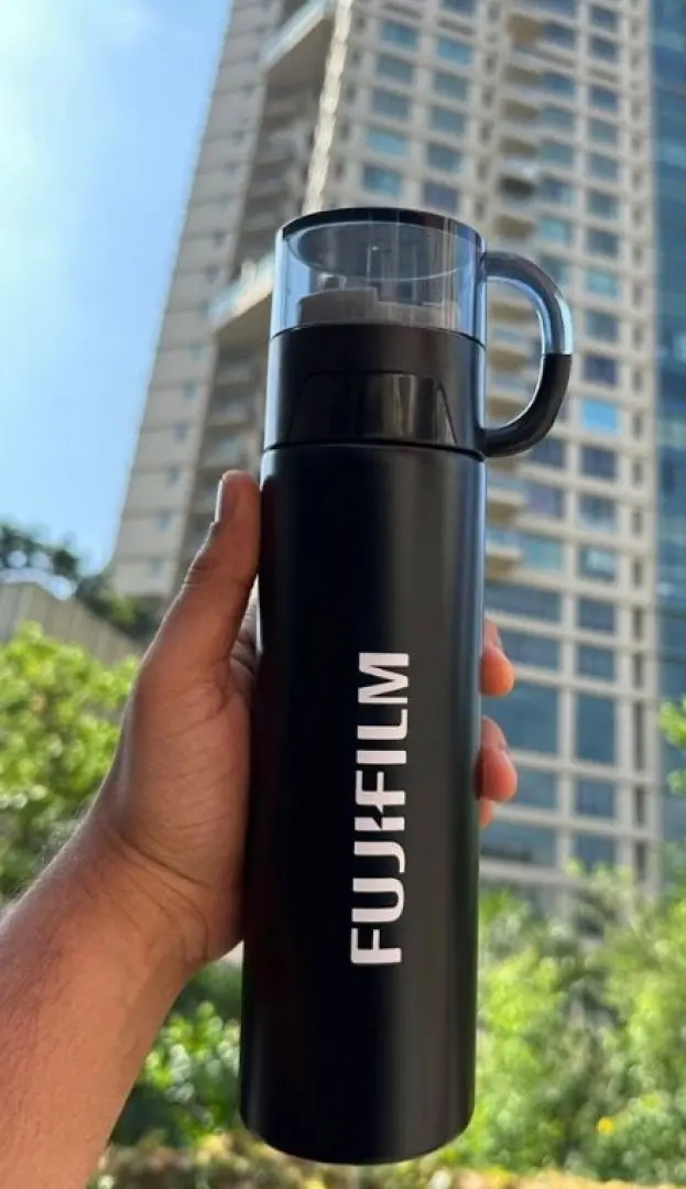 Black insulated bottle printed with Fujifilm branding