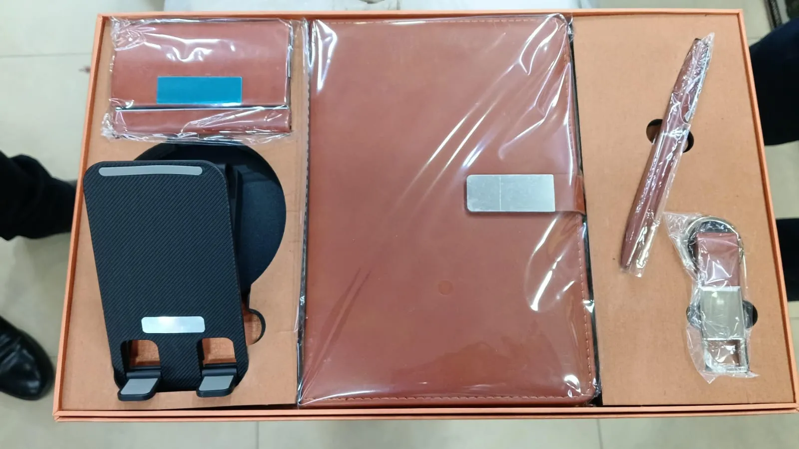 Brown diary, card holder, phone stand, pen and keychain office gift set