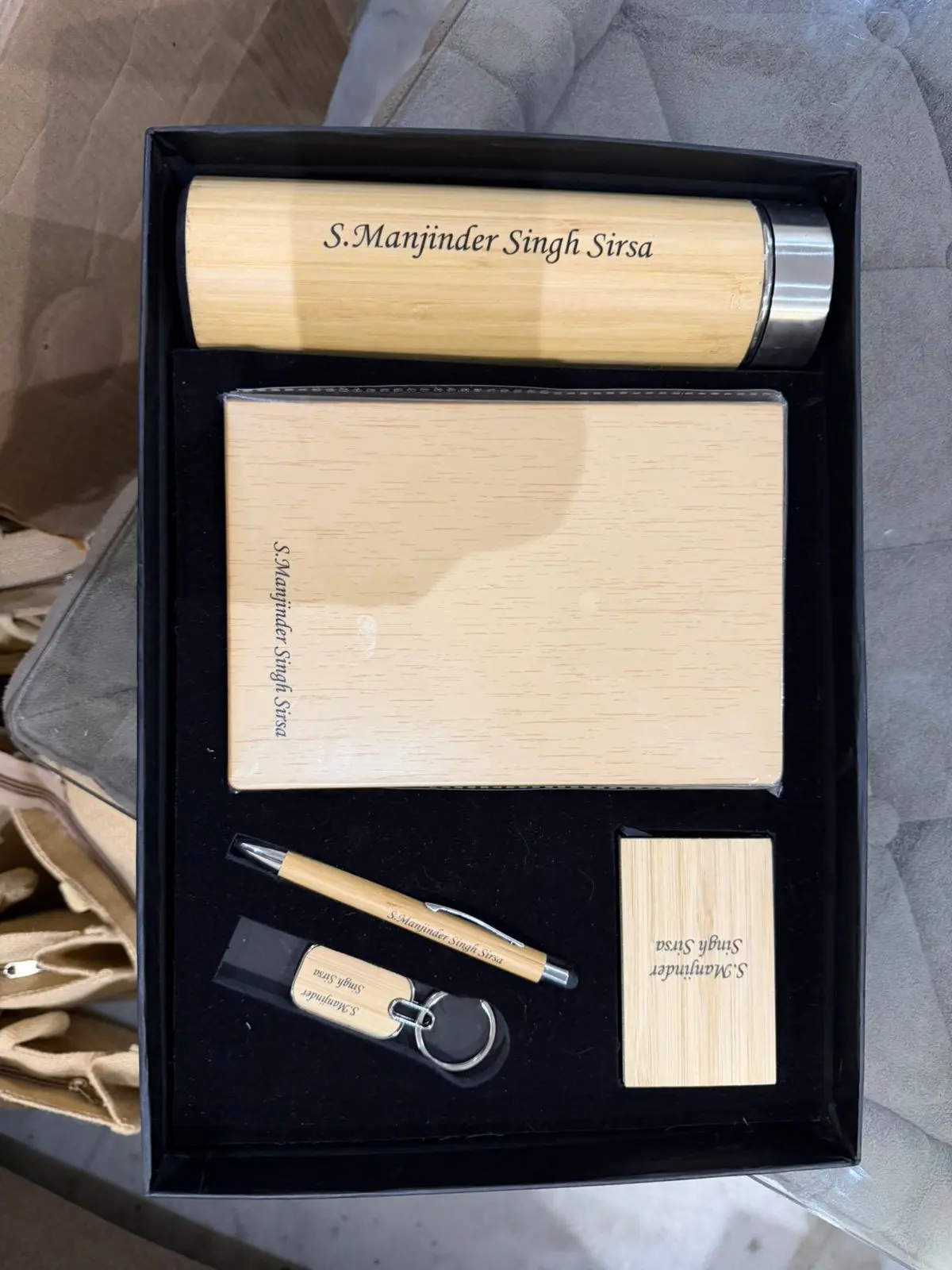 Personalised wooden gift set with bottle, desk mat, pen, keychain and card holder