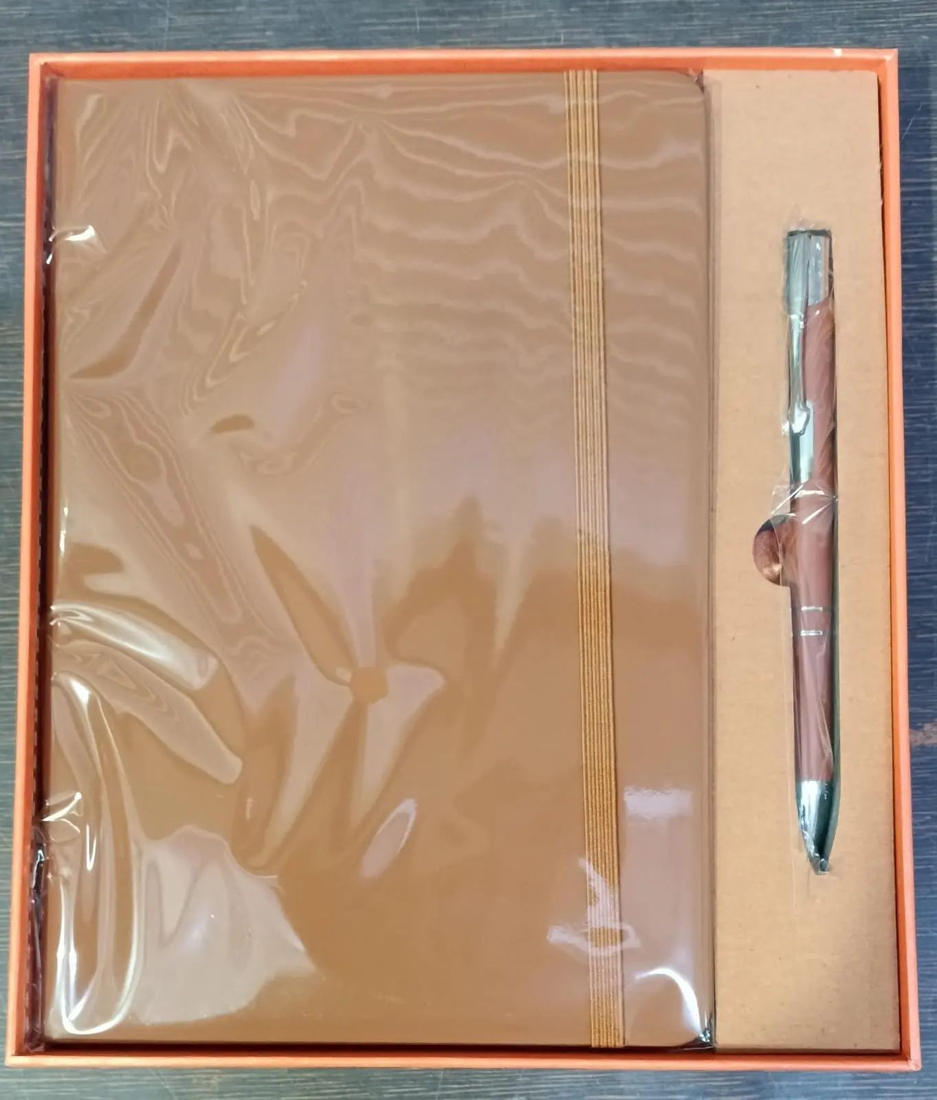 Brown diary and matching pen in a presentation gift box